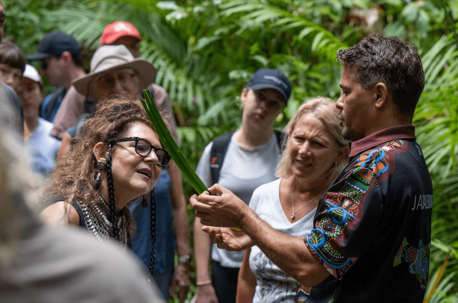 Yalada Tours guide sharing Kuku Yalanji knowledge with visitors in the rainforest